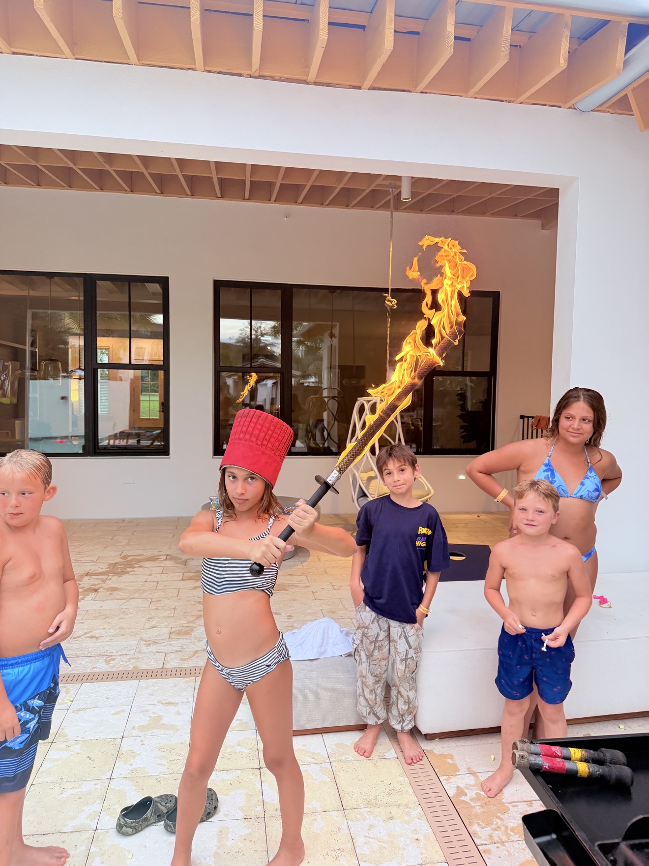 Guests taking a selfie in front of a huge hibachi flame burst in Florida